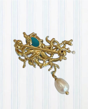 BLUE OCTOPUS, BLUE CUT GLASS STONE AND MOTHER OF PEARL BEAD STATEMENT BROOCH