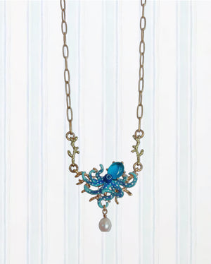 BLUE OCTOPUS, BLUE CUT CRYSTAL STONE AND MOTHER OF PEARL BEAD STATEMENT NECKLACE