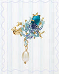 BLUE OCTOPUS, BLUE CUT GLASS STONE AND MOTHER OF PEARL BEAD STATEMENT BROOCH