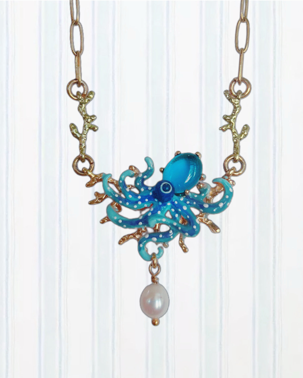 BLUE OCTOPUS, BLUE CUT CRYSTAL STONE AND MOTHER OF PEARL BEAD STATEMENT NECKLACE