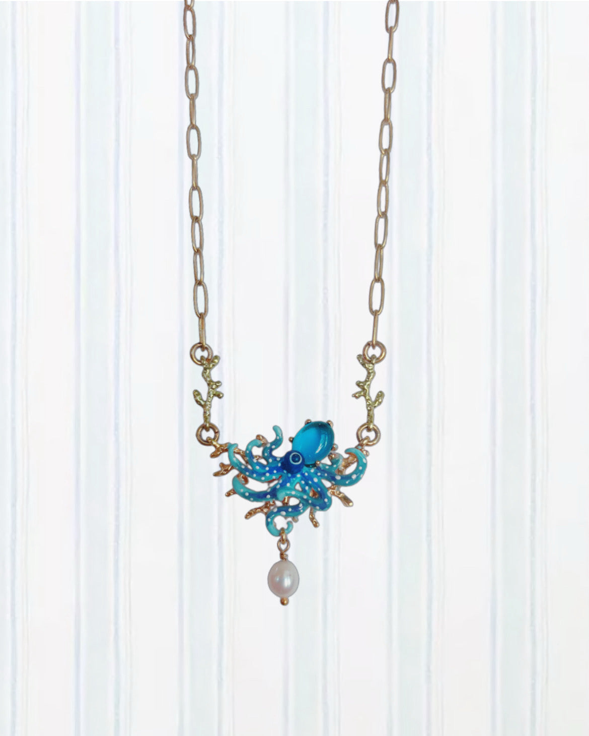 BLUE OCTOPUS, BLUE CUT CRYSTAL STONE AND MOTHER OF PEARL BEAD STATEMENT NECKLACE